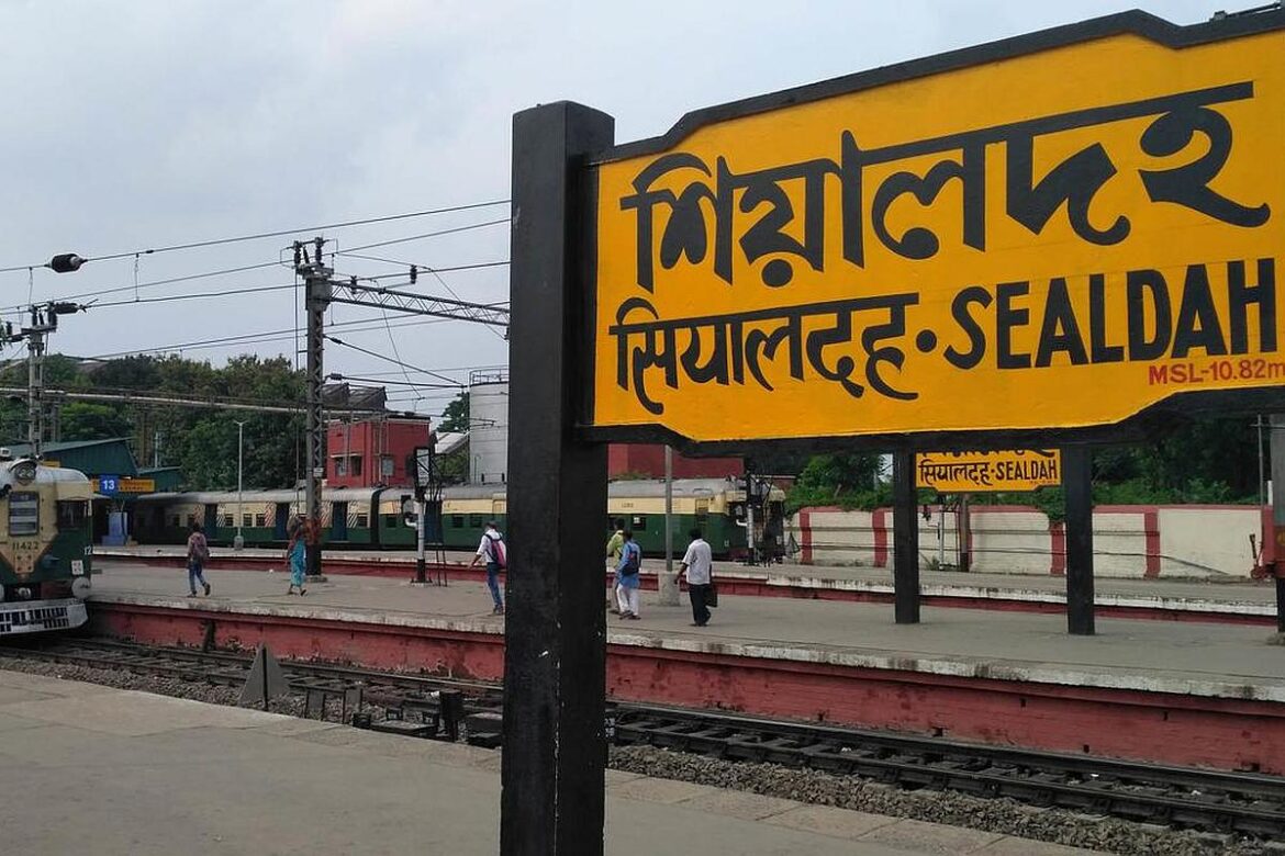 Why is the sea level written on the railway station board