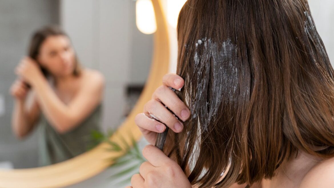 Which is more effective in solving oily scalp problems, oil or shampoo?